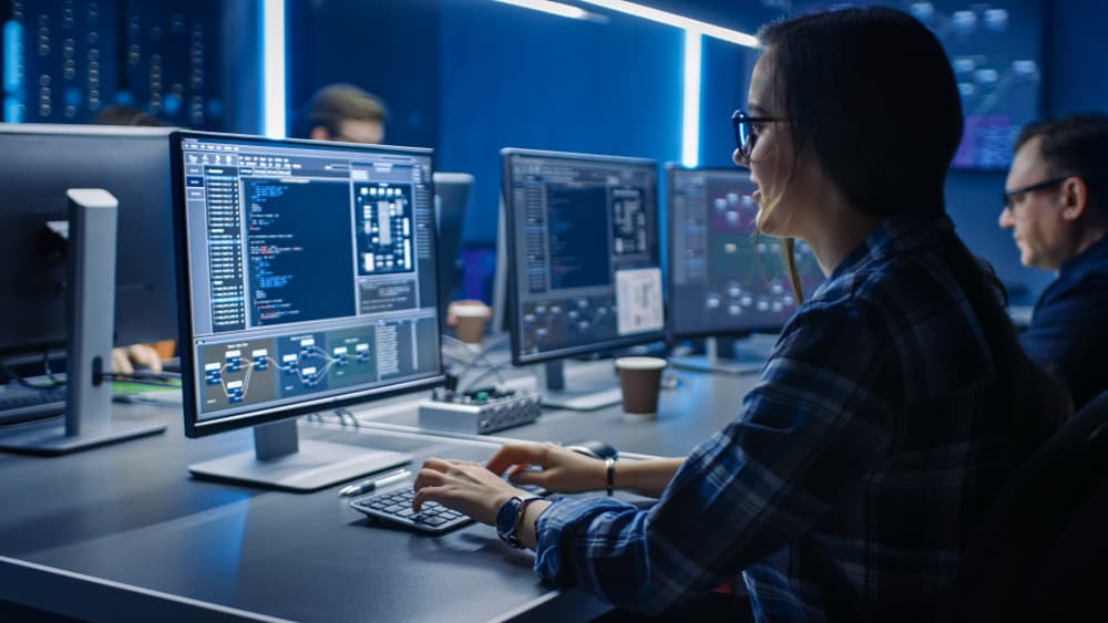 computer engineer working on a desktop computer